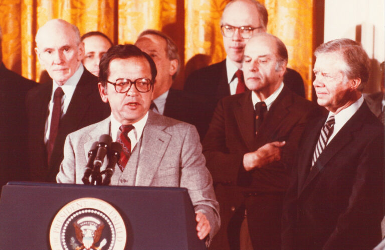 Sen. Ted Stevens speaks after President Jimmy Carter, right, signed H.R. 39, the Alaska National Interest Land Conservation Act (ANILCA) on December 2, 1980. (Print is from color slide) Stevens Foundation photo