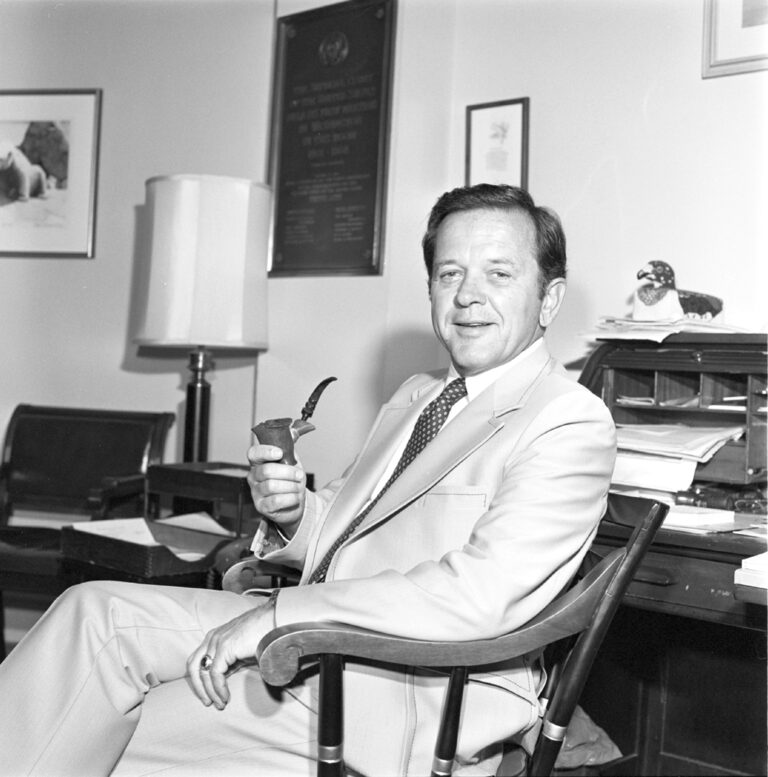 Sen. Ted Stevens enjoys a moment with his pipe in his office. U.S. Senate/Stevens Foundation photo