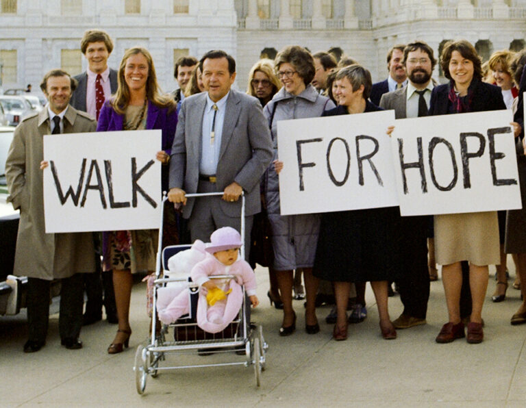 Sen. Ted Stevens, Catherine and baby Lily, along with staffers 