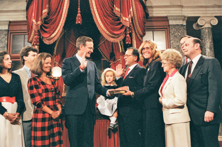 Surrounded by family and close friends and staff, Sen. Ted Stevens is ceremonially sworn-in to office by Vice-President George H.W. Bush on January 3, 1985 in the Old Senate Chambers in the Capitol. U.S. Senate / Stevens Foundation photo