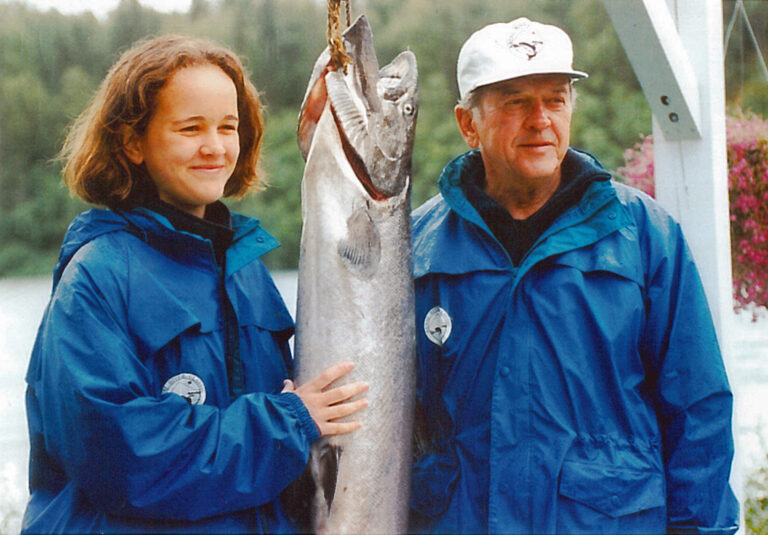 Lily Stevens with her father, Sen. Ted, and a 52 lb king salmon caught by Lily during the Kenai Classic on July 7, 1995. Lily began fishing at a young age and enjoyed fishing with her father. Mark Dolan / Stevens Foundation photo