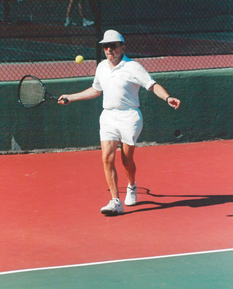 Sen. Ted Stevens playing tennis at the Landon School courts on July 18, 1998. Stevens was an avid tennis player and often participated in charity tournaments, including this benefit event for the Institute of Education organized by Kathy Kemper aka Coach K. Courtesy Kathy Kemper/Stevens Foundation photo