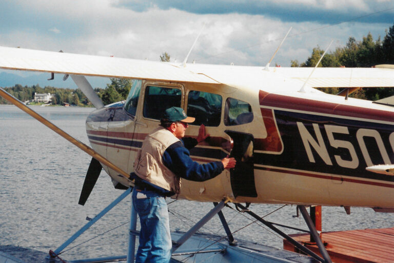 1999-08-26, Senator Ted Stevens on the day he completed FAA single engine Sea Pilot certification on E. Mackey Lake on the Kenai Peninsula while with friend Tom Wardleigh. Stevens Foundation photo