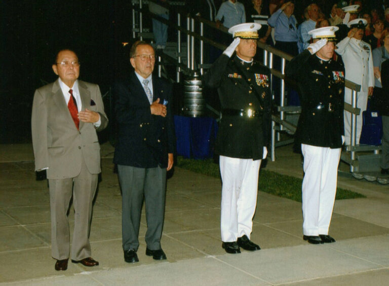 Senator Daniel Inouye (D-HI) (left) and Senator Ted Stevens (2nd left) during an Evening at Marine Barracks, Washington, D.C. on May 27, 2004. The two senators were the guests of honor for the evening. Both senators were veterans of WW II and were close friends. Marine Barracks photo/Stevens Foundation