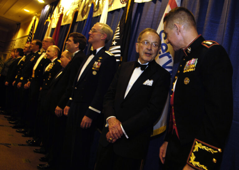 Alaskan Senator Ted Stevens and Chairman of the Joint Chiefs of Staff, Marine Gen. Peter Pace, talk prior to an award ceremony of the 30th Annual Salute to the Military hosted by the Armed Services WMCA of Alaska, in Anchorage, AK, Feb. 23, 2007. Defense Dept. photo by Staff Sgt. D. Myles Cullen (released)