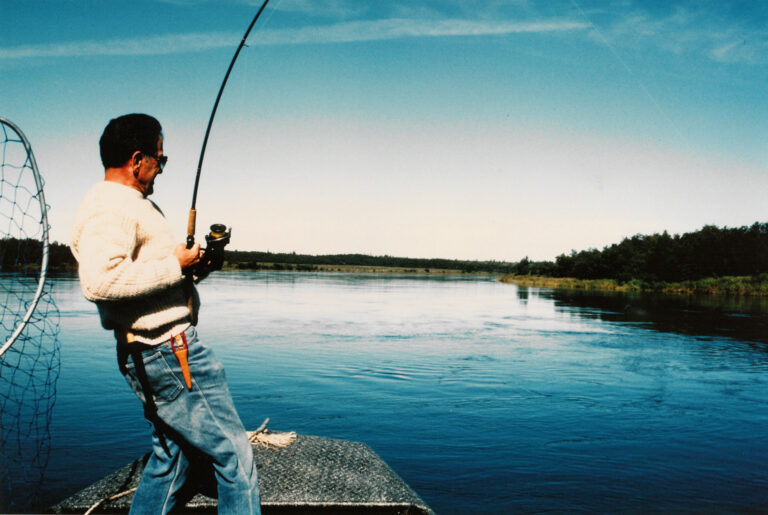 No date, no info. TS fishing on a lake, likely Alaska, ca 1985?
Stevens Foundation photo
Photo on display in TSF office.