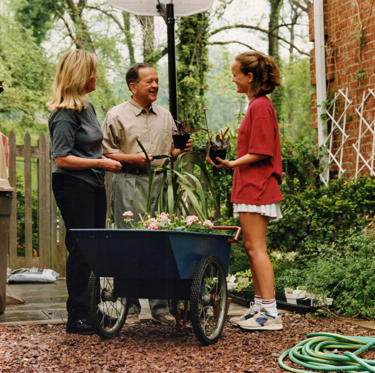 ca 1996 summer, Senator Ted, Catherine and Lily Stevens gardening at home in Georgetown?, possibly for campaign? (Stevens Foundation photo)